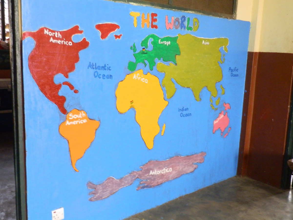 Die Welt wie unsere Kidz sie sehen - Globus auf Wand gemalt